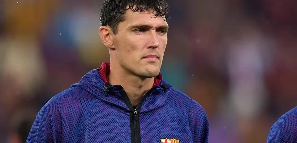 Player in FC Barcelona jacket during match warm-up