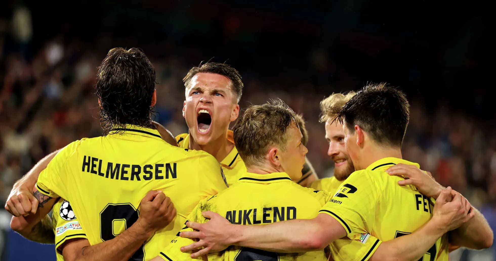 Players celebrating a goal during UEFA Champions League