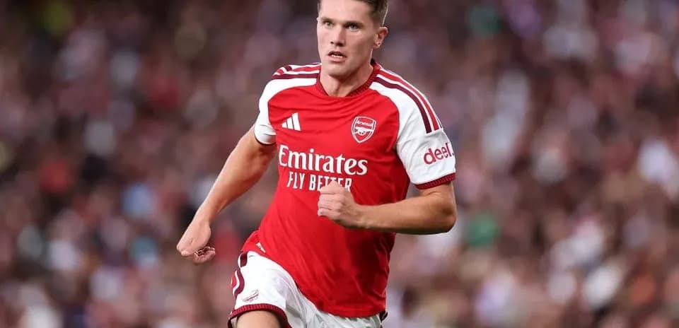 Arsenal player running during a match