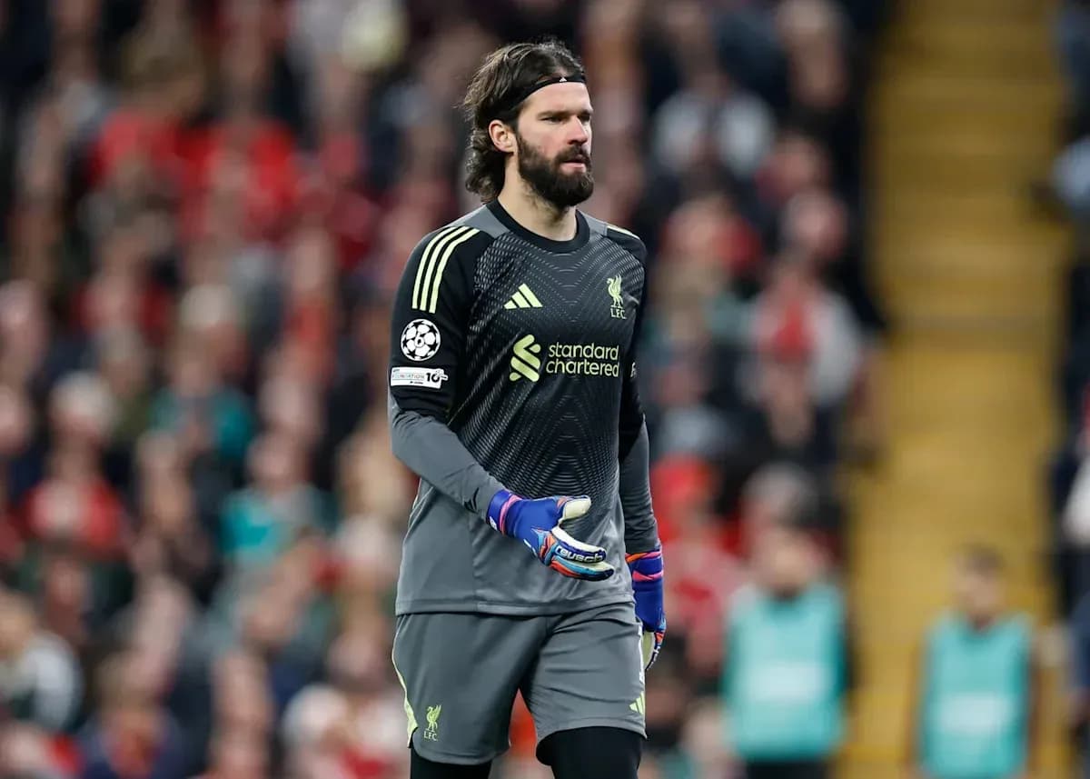 Goalkeeper in Liverpool kit during match action