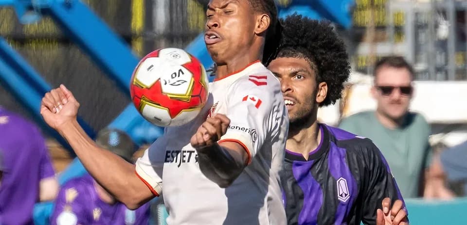 Cavalry FC player controlling the ball during match