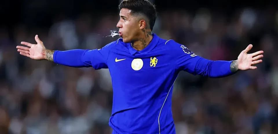 Player gesturing during match in blue jersey