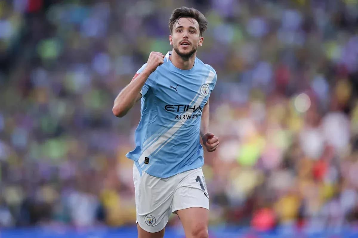 Player celebrating after scoring for Manchester City