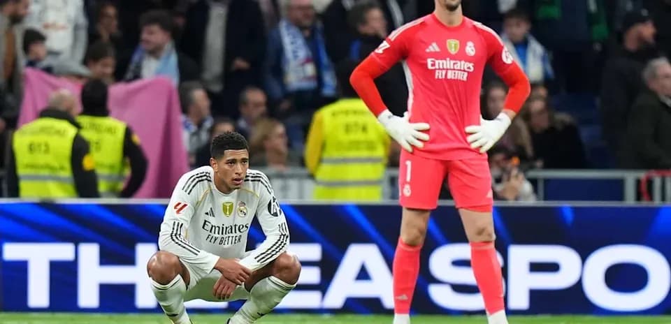 Real Madrid players on the field after a match