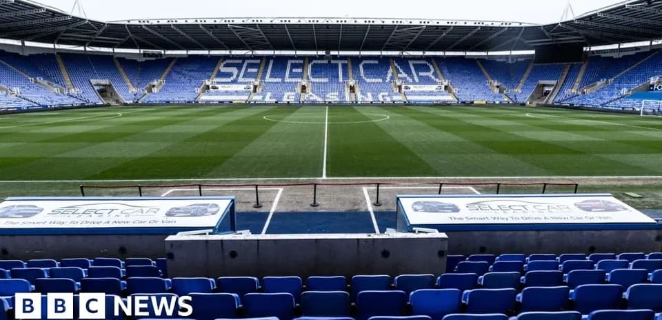 Empty stadium seats and pitch at Select Car Leasing Stadium