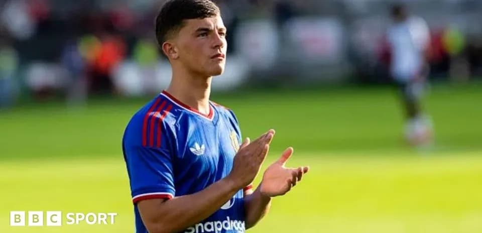Player applauding fans during match at stadium