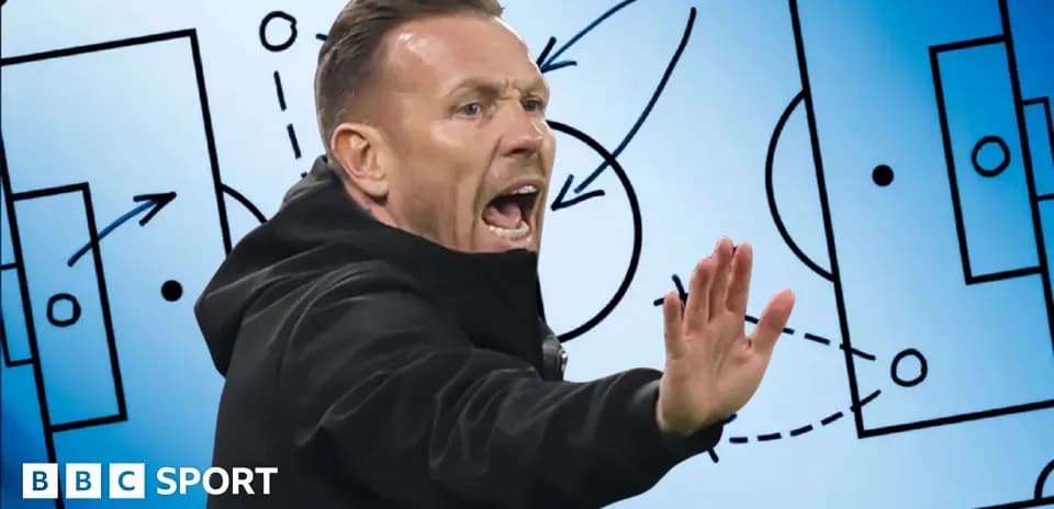 Coach giving instructions with tactical board in background