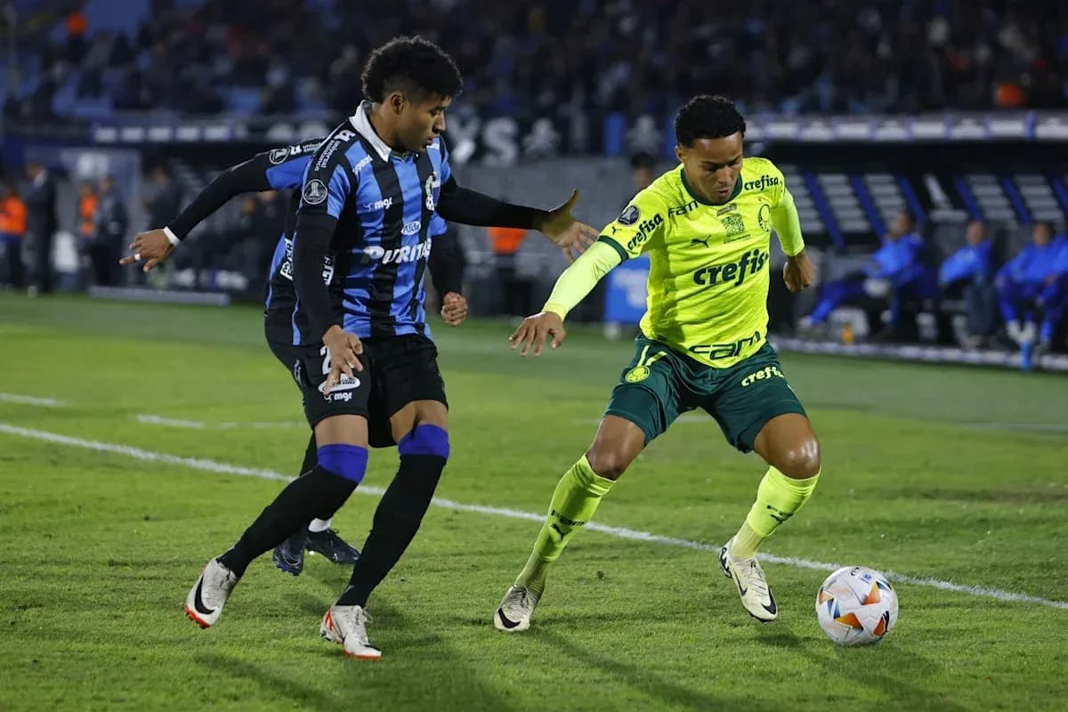 Two players contesting for the ball during match
