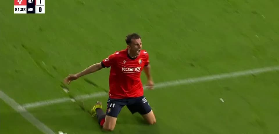Osasuna player celebrating goal against Atletico Madrid