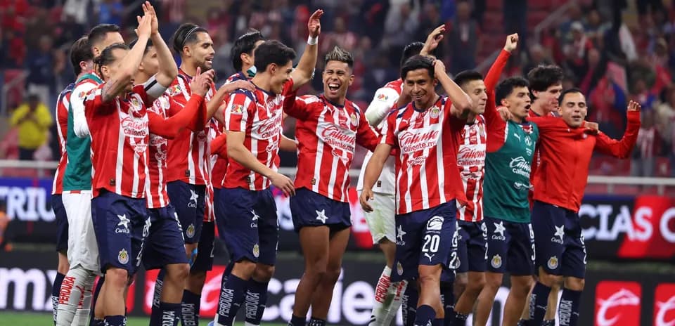 Chivas celebrating victory after Liga MX match