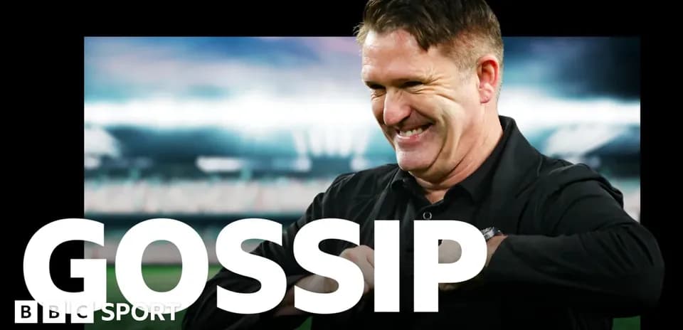 Man smiling in front of a sports stadium backdrop