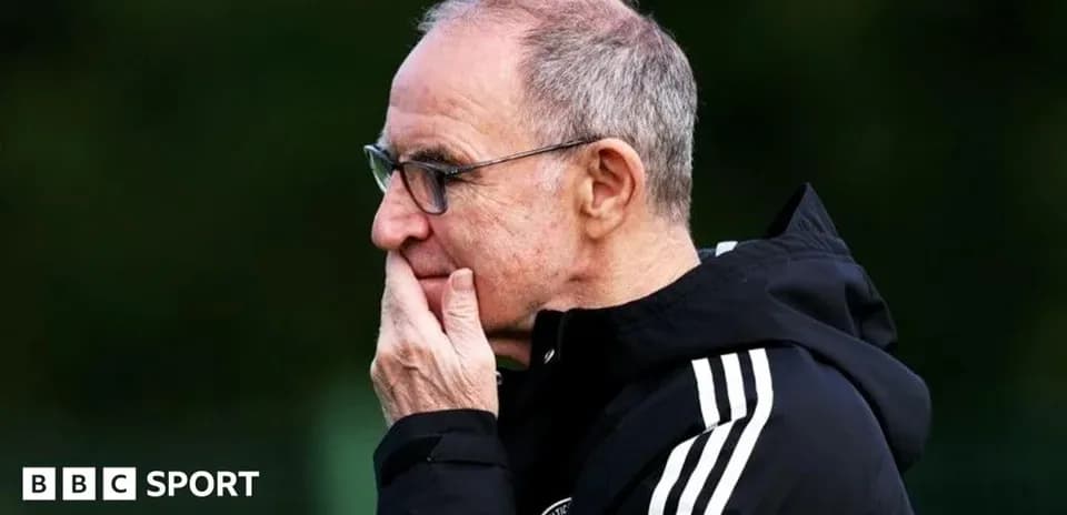 Coach observing during training session in sportswear