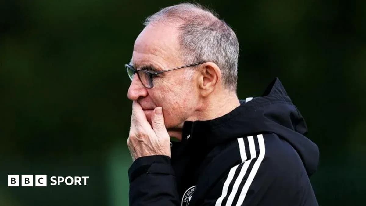 Coach observing during training session in sportswear
