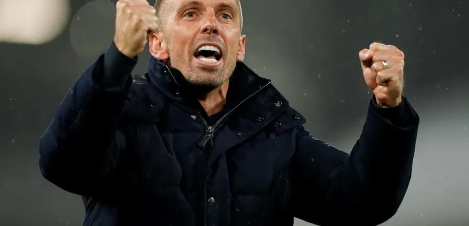 Coach celebrating passionately during match