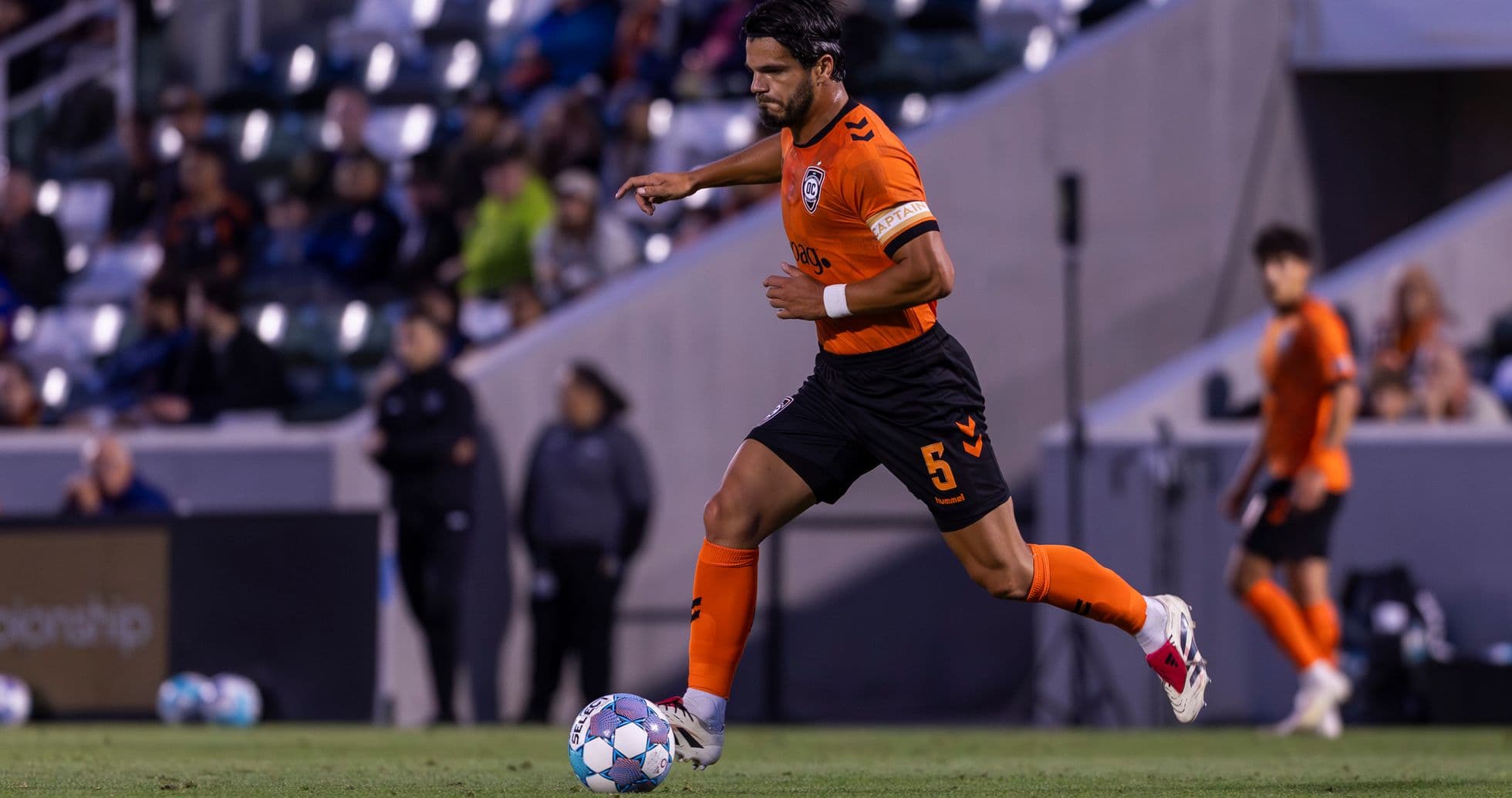Player dribbling the ball during match