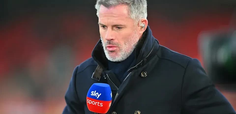 Sports commentator holding microphone on field