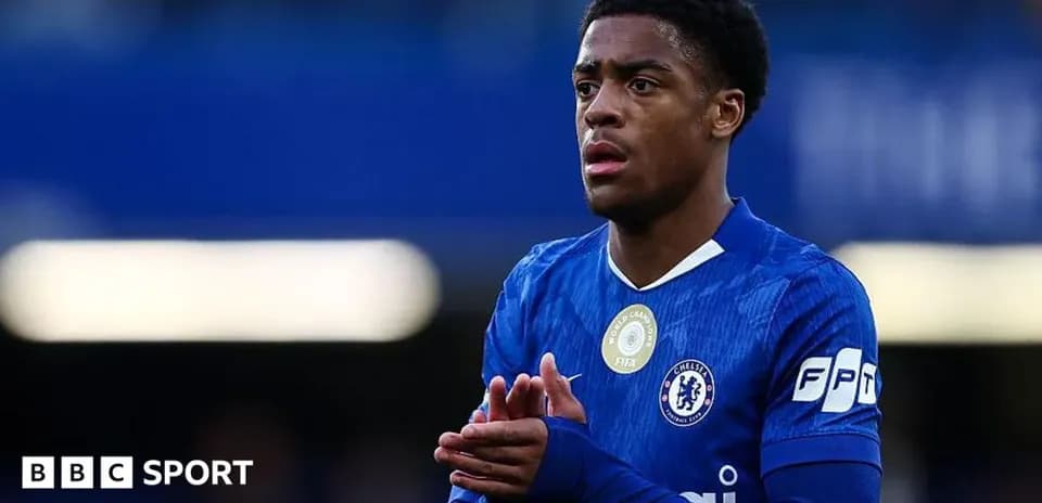 Chelsea player preparing for match on the field
