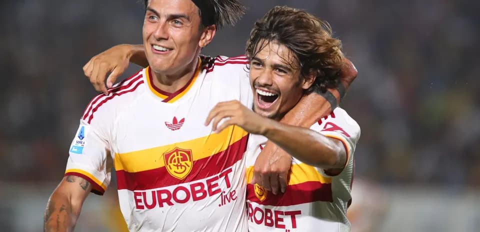Players celebrating goal for AS Roma