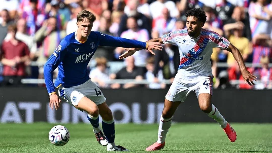 Two players contesting the ball during a match