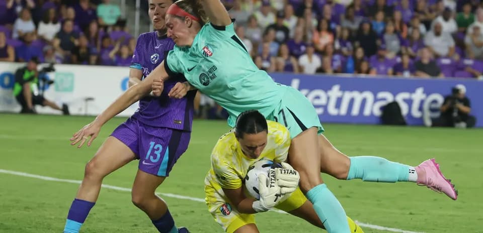 Goalkeeper making a save during match