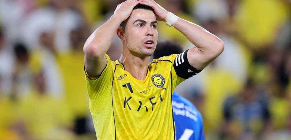 Player in yellow jersey reacting during a match