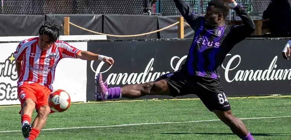 Player striking the ball during Atlético Ottawa match
