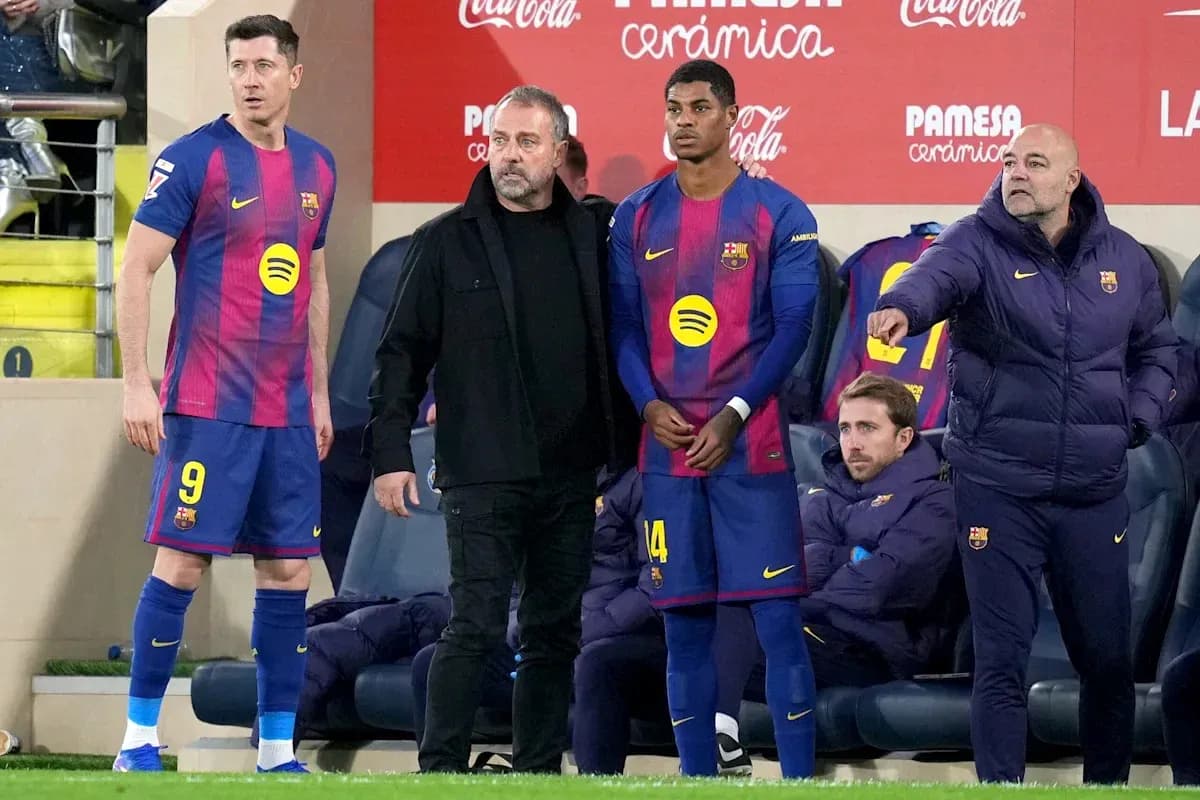 Barcelona players and staff during match substitution