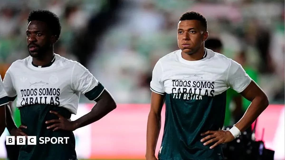 Players wearing warm-up shirts before the match