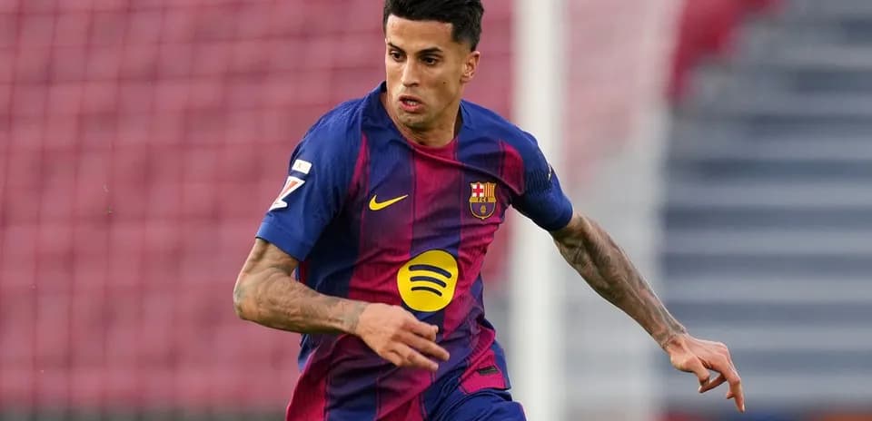 Player in Barcelona kit running on the field