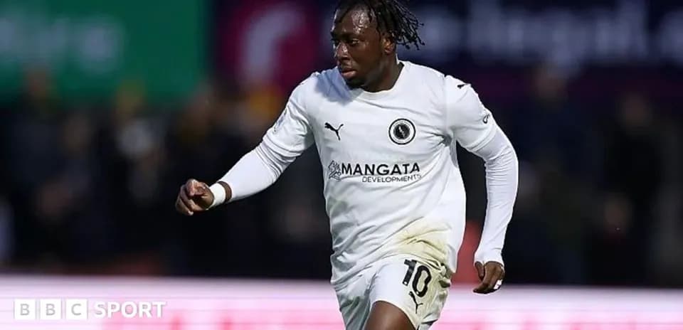 Player celebrating after scoring a goal during match