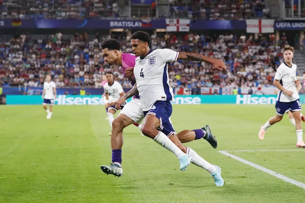 Two players competing for the ball during match