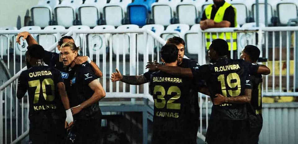 Players celebrating a goal during UEFA match