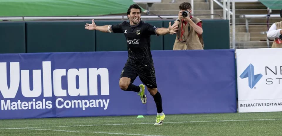 Player celebrating a goal during USL Championship match