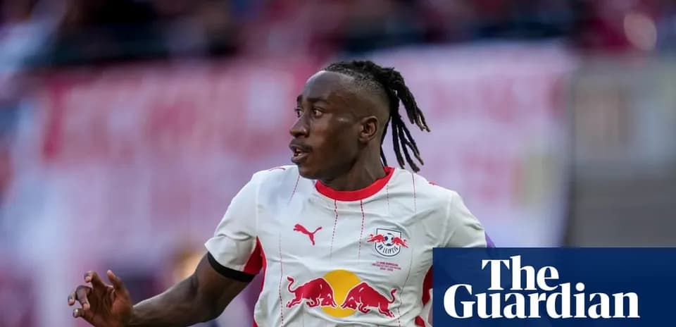 Player running during a match wearing RB Leipzig kit