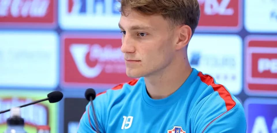 Player at press conference with Croatia team jersey