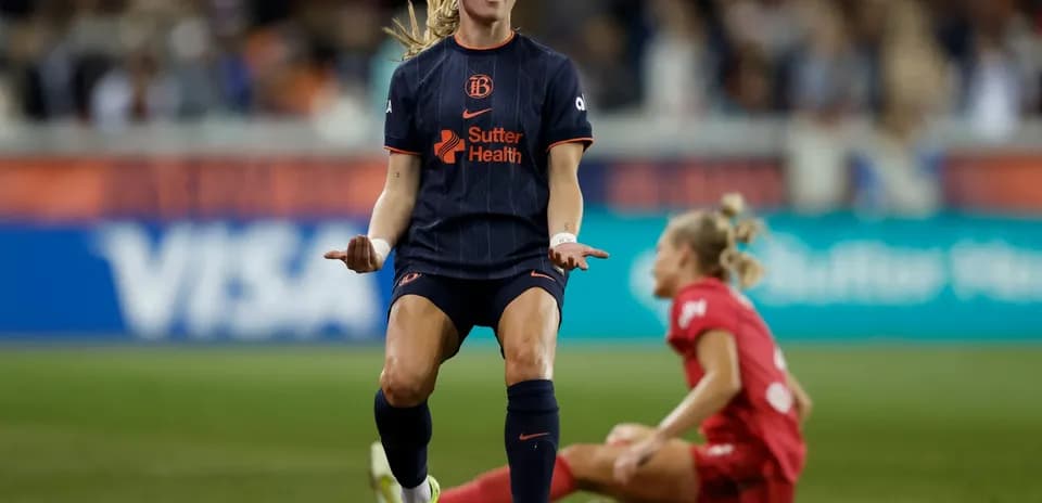 Bay FC player celebrating a goal during match