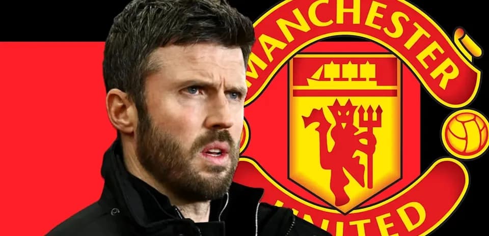 Man with beard in front of Manchester United logo