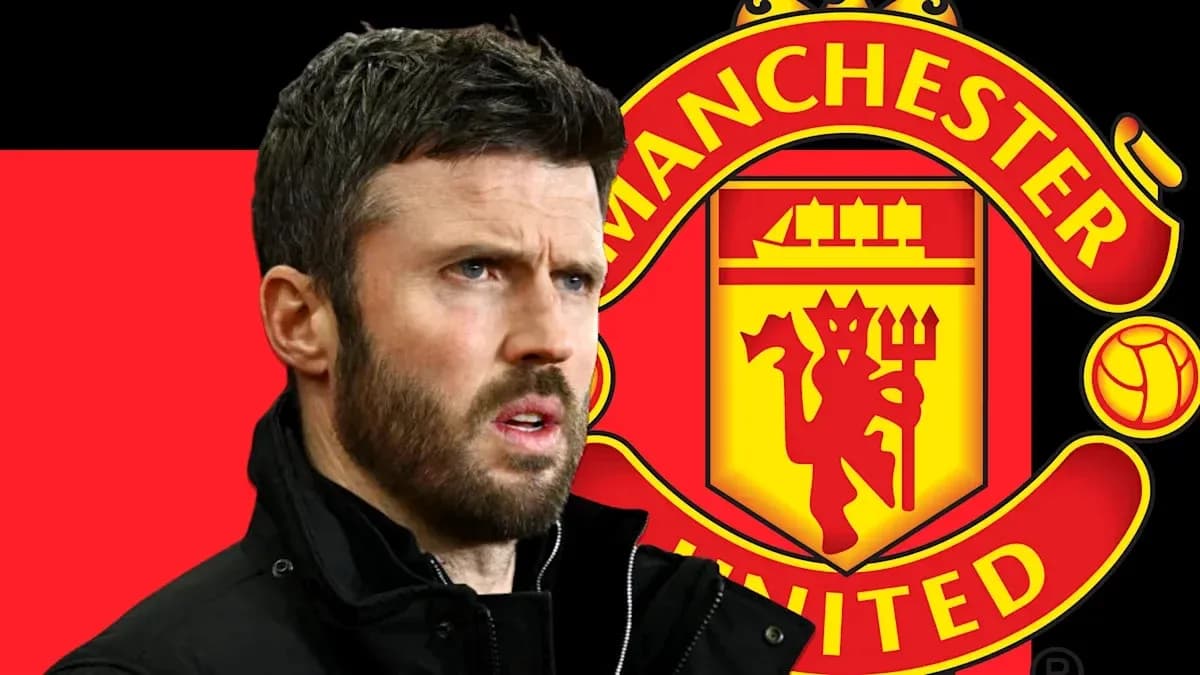 Man with beard in front of Manchester United logo