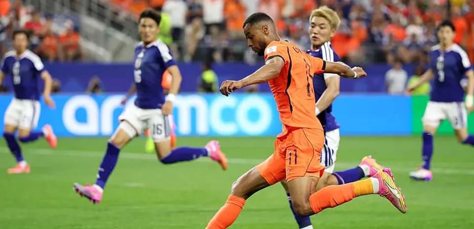 Player kicking ball during Netherlands vs Japan match