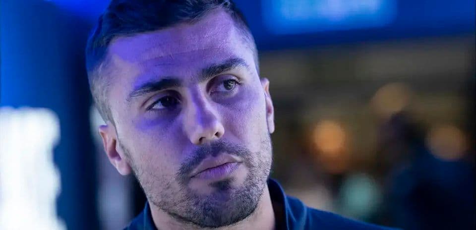 Athlete with short hair in blue lighting