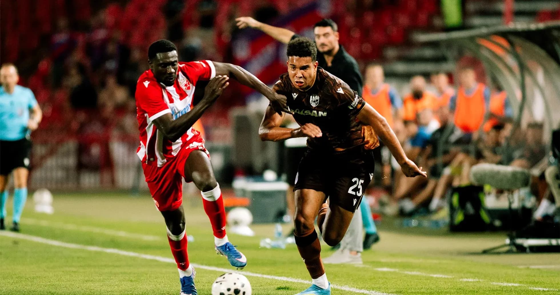 Players competing for the ball during match