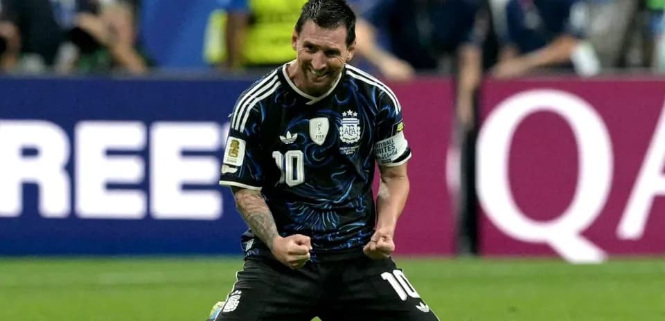 Player celebrating on the field after scoring