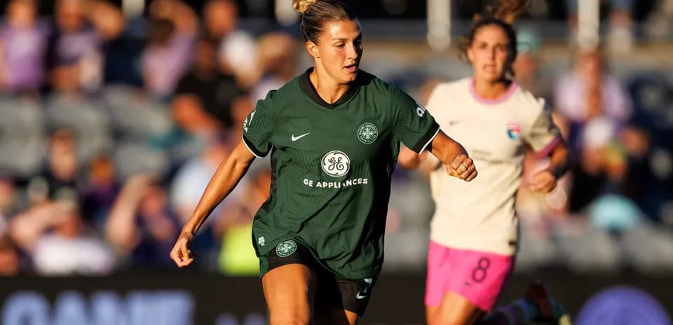 Racing Louisville player in action during match