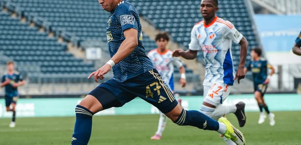 Player kicking the ball during Union II match
