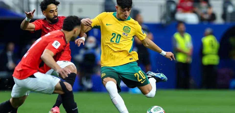 Player kicking the ball during Australia vs Egypt match