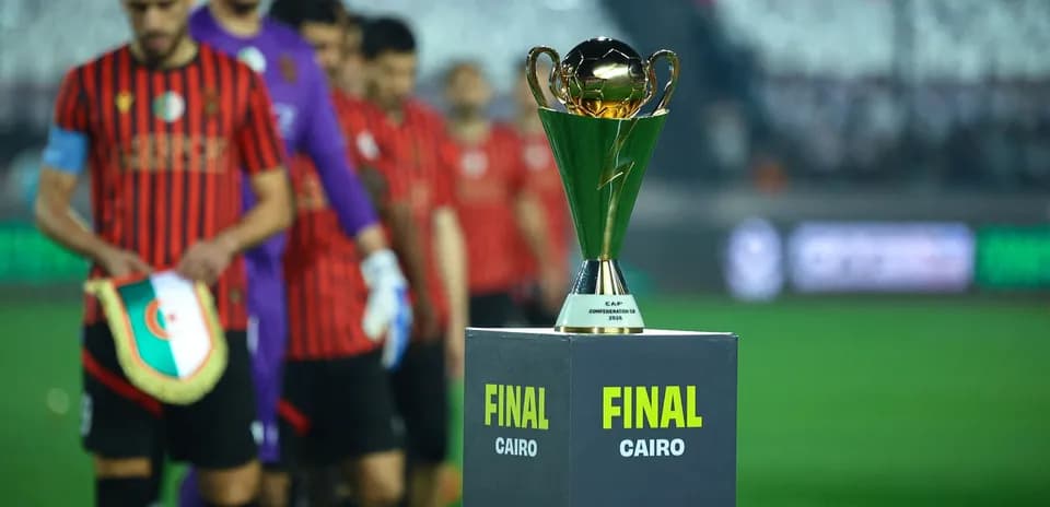 Teams entering the field with trophy before final