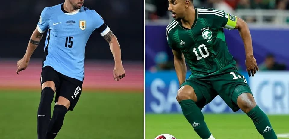 Players from Saudi Arabia and Uruguay during match