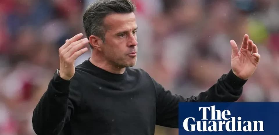 Manager gesturing during a football match