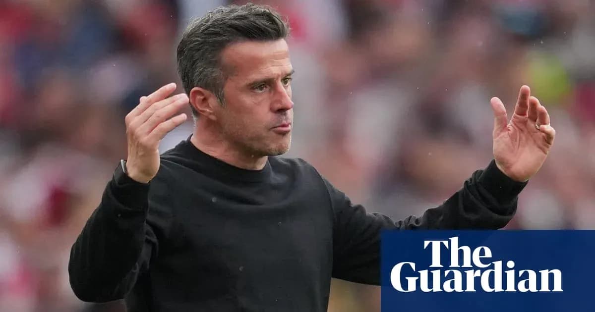 Manager gesturing during a football match