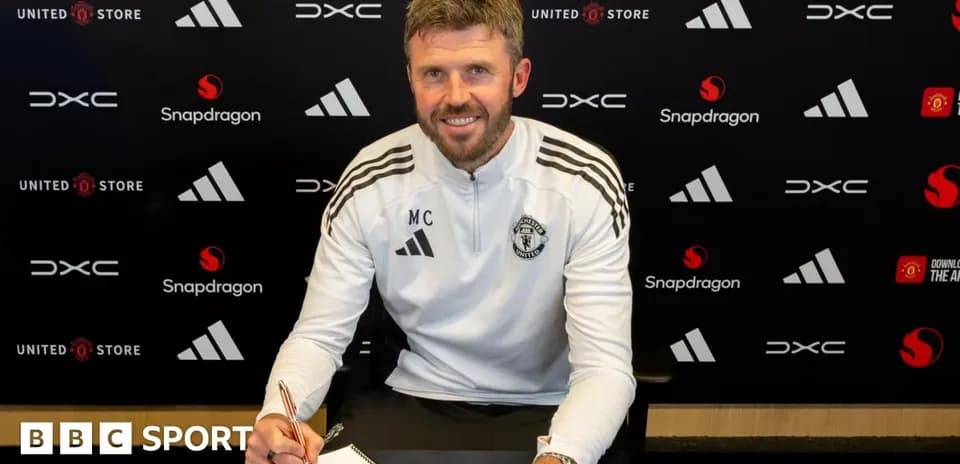 Coach signing contract at Manchester United announcement